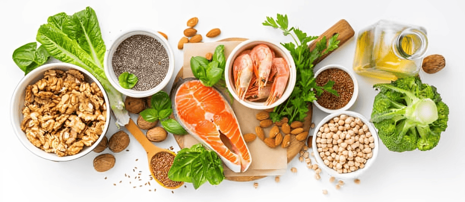 Assorted protein-rich foods including meat, eggs, legumes, nuts, dairy, and seeds